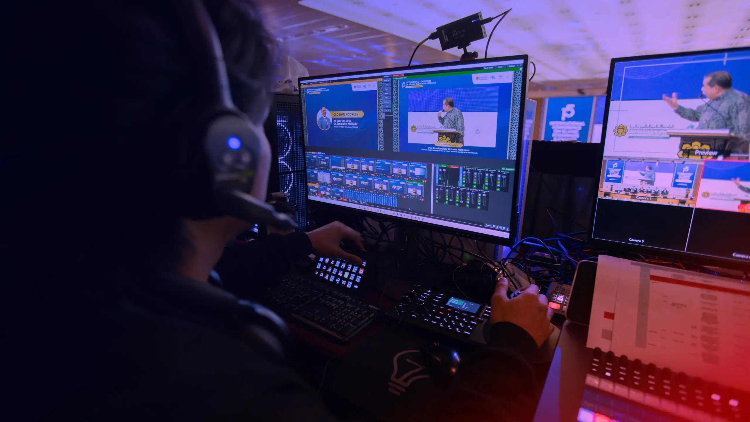 Event production team monitoring a live multi-camera feed.